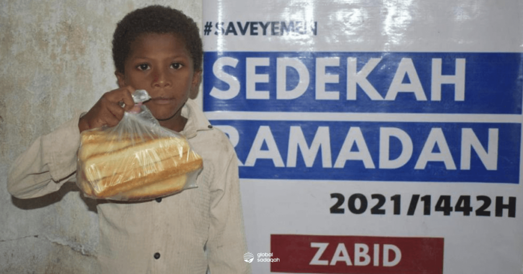 Hunger One of the young beneficiaries of phase 1 of the Yemeni Bakery Project that offered free bread to the underserved.